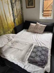 Ένα ή περισσότερα κρεβάτια σε δωμάτιο στο Holiday Home With Sea View