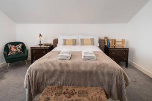 Postel nebo postele na pokoji v ubytování Pass the Keys Spacious and Quiet Flat in Aylesbury