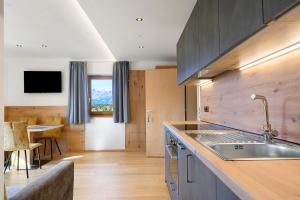 Kuchyň nebo kuchyňský kout v ubytování Tratterhof