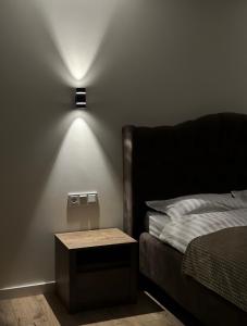 Postel nebo postele na pokoji v ubytování Люкс апартаменти Площа,Госпіталь