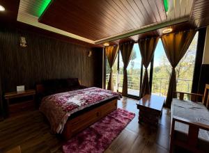 Postel nebo postele na pokoji v ubytování DHAKAR Homestay