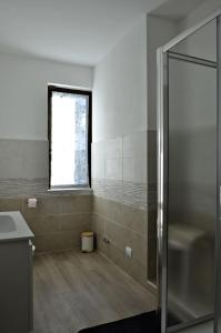 Koupelna v ubytování A Casa di Alfonso Malpensa Airport + 77 fotografií