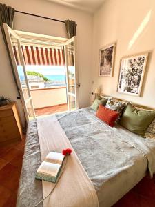 Postel nebo postele na pokoji v ubytování Brezza Calabra + 26 fotografií