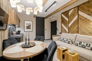 Χώρος καθιστικού στο Aparthotel Białka SKI, Odkryj-Bialke