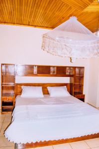 Postel nebo postele na pokoji v ubytování Green Nest Homestay