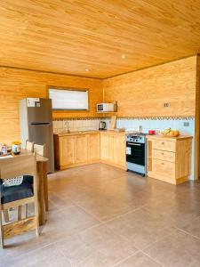 Kuchyň nebo kuchyňský kout v ubytování Cabañas Rimü - Cabaña para 6 personas + 4 fotografie