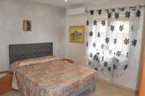 Postel nebo postele na pokoji v ubytování Sole&luna