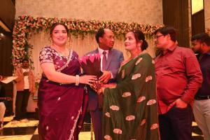 a group of people standing in front of a altar at Hotel Peepal Star in Siwān