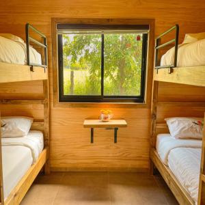 Postel nebo postele na pokoji v ubytování Cabañas Rimü - Cabaña para 6 personas