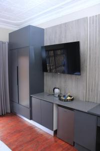 Kuchyň nebo kuchyňský kout v ubytování Lukhanya Guesthouse