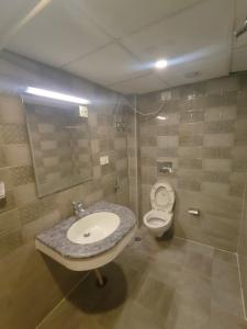 Un baño de Welcome Inn Boutique Hotel