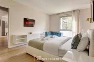 Postel nebo postele na pokoji v ubytování Residence d'Exception - 5 Chambres aux Portes de Paris