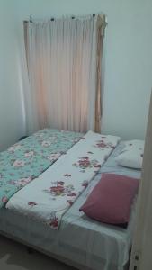 Postel nebo postele na pokoji v ubytování hspedagemfuncional