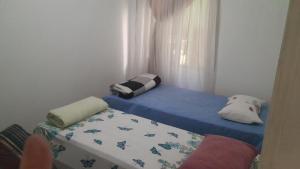 Postel nebo postele na pokoji v ubytování hspedagemfuncional