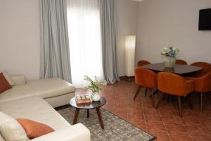 TV a/nebo společenská místnost v ubytování Monte Aria panorama suites