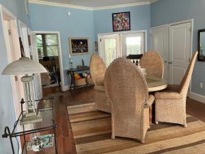 a dining room with a table and chairs at Rehoboth Beach Haven in Rehoboth Beach