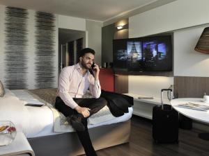 TV in/ali zabaviščno središče v nastanitvi Pullman Dakar Teranga