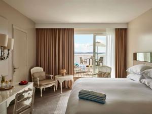Postel nebo postele na pokoji v ubytování Sofitel Golfe d'Ajaccio Thalassa Sea & Spa