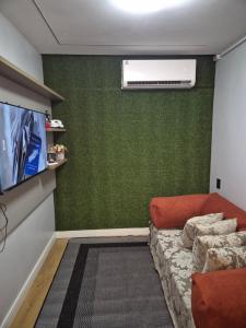 TV a/nebo společenská místnost v ubytování Casa Container Luz + 17 fotografií