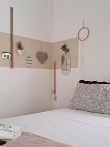 En eller flere senge i et værelse på Chalezinho D'Ajuda