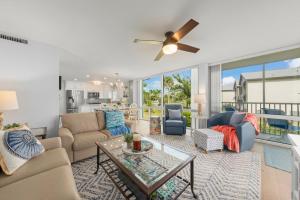 a living room with a couch and a table at Island Beach Club 210E in Sanibel