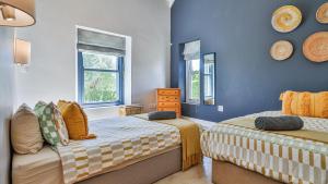 Postel nebo postele na pokoji v ubytování Vygievlei