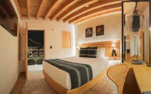 Ένα ή περισσότερα κρεβάτια σε δωμάτιο στο Casa Ziña