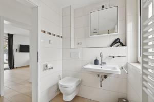 Et badeværelse på GU02 Wohnung mit Terrasse in Griesheim!