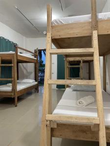 Ένα ή περισσότερα κρεβάτια σε δωμάτιο στο RedDot Guest House