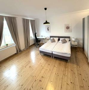 Postel nebo postele na pokoji v ubytování Parkview Premium Apartment