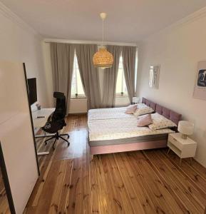 Postel nebo postele na pokoji v ubytování Parkview Premium Apartment