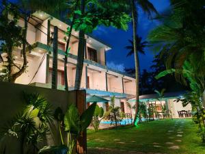 an exterior view of a resort at night at Amarante Madiha in Matara