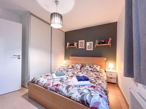 En eller flere senge i et værelse på La Piste Bleue