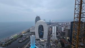 an aerial view of a city with tall buildings at BLACK SEA ORBI APARTAMENT s in Angisa