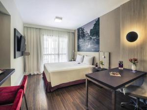 Postel nebo postele na pokoji v ubytování Mercure Sao Paulo Alamedas
