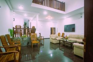 Posezení v ubytování Maali Resistance