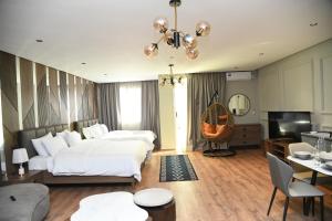 Ένα ή περισσότερα κρεβάτια σε δωμάτιο στο Suite Bahiya 11