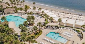 an overhead view of a resort with two pools and a beach at DP2931: 2931 Deer Point in Seabrook Island
