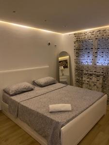 Postel nebo postele na pokoji v ubytování La maison du bonheur