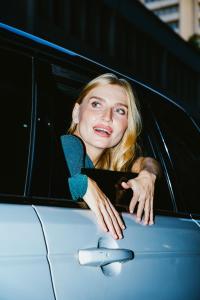 a woman looking out the window of a car at Oum Palace Hotel & Spa in Casablanca +36 photos