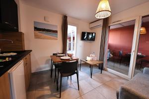 Μια τηλεόραση ή/και κέντρο ψυχαγωγίας στο U Bellu - Modernité et calme à deux pas de la mer