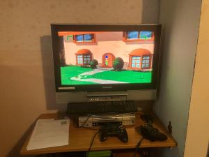 TV a/nebo společenská místnost v ubytování Het werkhuis, terug in de tijd