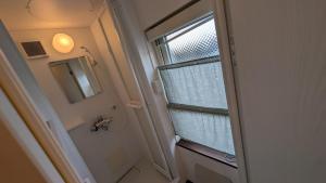 Koupelna v ubytování Hakodate Stay Walk to Onsen and History + 18 fotografií