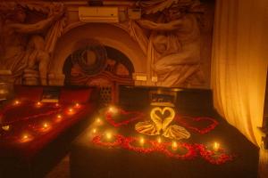 a altar with hearts and candles in a church at Urban homestay volcastay in Zirakpur
