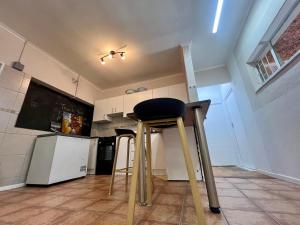 Η κουζίνα ή μικρή κουζίνα στο Jabulani's Serenity