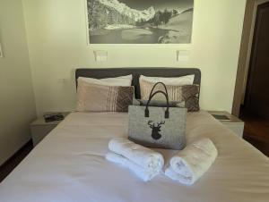 Ένα ή περισσότερα κρεβάτια σε δωμάτιο στο Maison Poluc - Maison Monte Rosa +19 φωτογραφίες