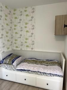 Ένα ή περισσότερα κρεβάτια σε δωμάτιο στο apartment