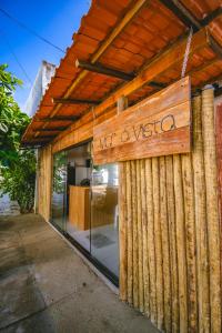 a building with a sign that reads not anesthesia at Mar a Vista by Concavus in Porto De Galinhas
