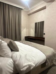 Ένα ή περισσότερα κρεβάτια σε δωμάτιο στο Nord Gate