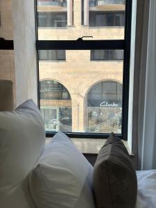 Ένα ή περισσότερα κρεβάτια σε δωμάτιο στο Nord Gate +1 φωτογραφίες